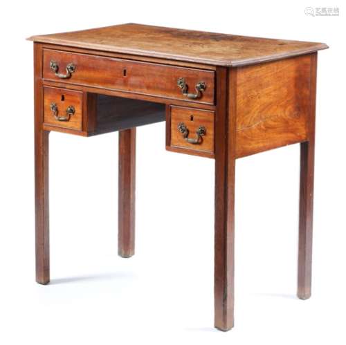 A George III mahogany lowboy, the top with a moulded edge above three drawers, on moulded and