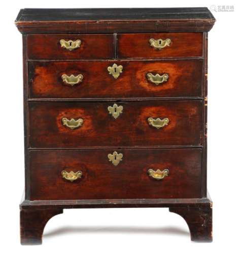 An Anglo-Chinese padouk chest, the oak top above two short and three long drawers, on stained