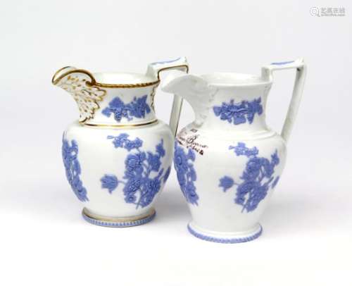 Two Samuel Alcock porcelain jugs c.1840, sprigged in lilac with bold flower sprays on a white