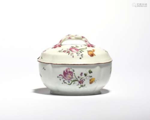 A Mennecy sauce tureen and cover c.1760, of quatrefoil form, painted with flower sprays in