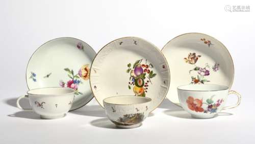 Two German porcelain cups and saucers c.1760, one Höchst and painted with loose flower sprays, the