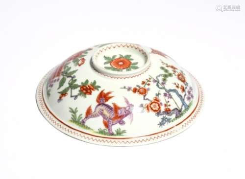 A Du Paquier bowl lid c.1725-30, finely painted to the domed exterior with a kylin type dog beside