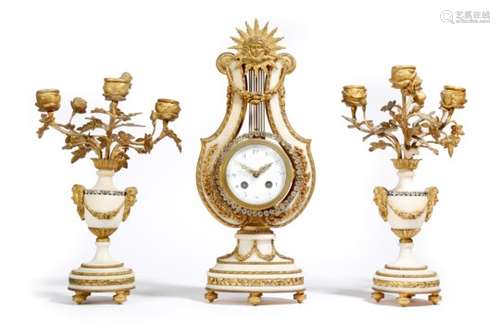 A late 19th century French white marble and ormolu clock garniture in Louis XVI style, the lyre