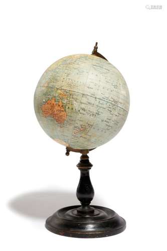 An early 20th century Philip's six inch terrestrial table globe, made of twenty-four printed and