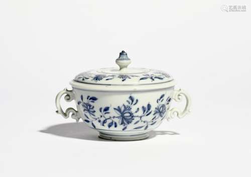 A Doccia ecuelle and cover c.1750-60, decorated in underglaze blue with flowering peony branches