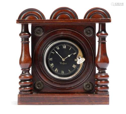 An early 19th century mahogany watch stand, inlaid with stringing and brass mounts, the triple