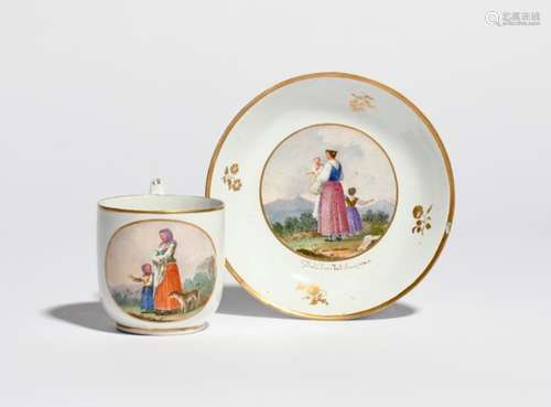 A Naples (Real Fabbrica Ferdinandea) coffee cup and saucer c.1790, painted with vignettes of Italian