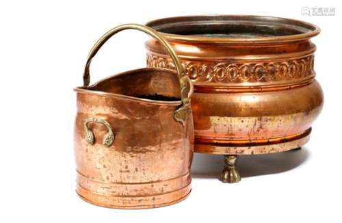 A late 19th century Dutch copper planter, on cast brass lion's paw feet, together with a small