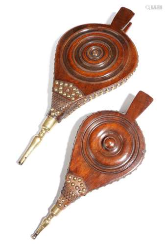 A pair of George III mahogany and elm bellows, with a brass spout and studded decoration, together