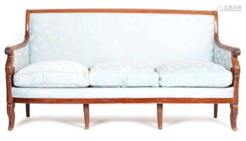 A French Louis Philippe mahogany three seater canapι, later upholstered in blue silk, with lappet