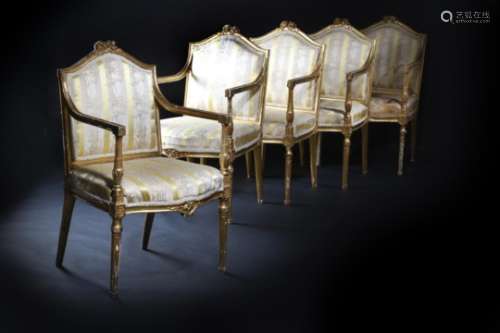 A set of five 19th century French giltwood fauteuils, each with a moulded frame carved with leaves