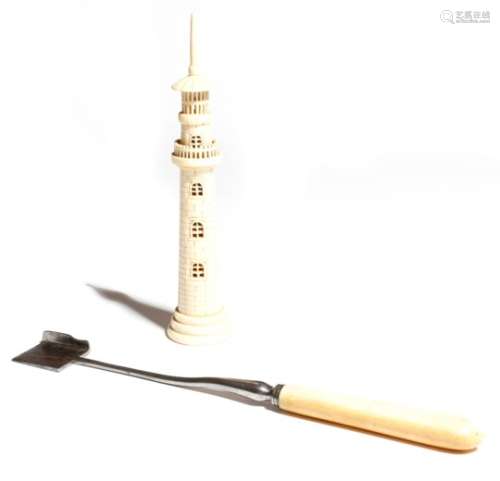 λ A Victorian carved bone model of a lighthouse, the screw-off base with an inner thread