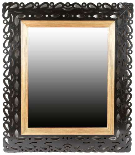 A 19th century Italian ebonised wood wall mirror, the later rectangular plate within a reeded gilt