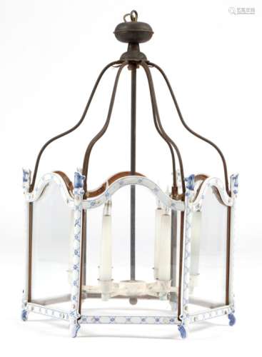 A continental blue and white porcelain hexagonal hall lantern, with arched glass panels (one