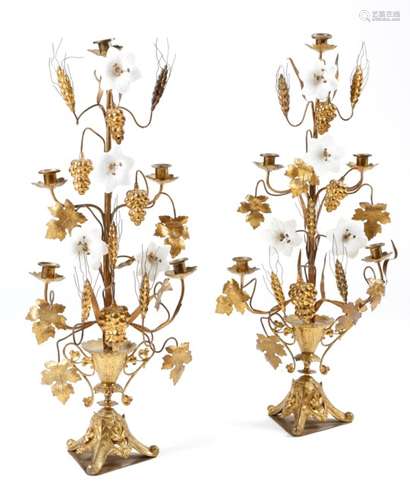 A pair of Victorian gilt brass and opaline five-light candelabra, each with an urn issuing lilies