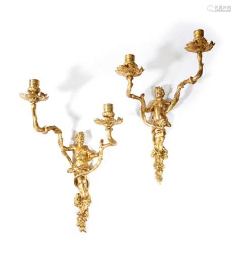 A pair of French ormolu twin-light wall appliques in Rιgence style, each with a classical figure
