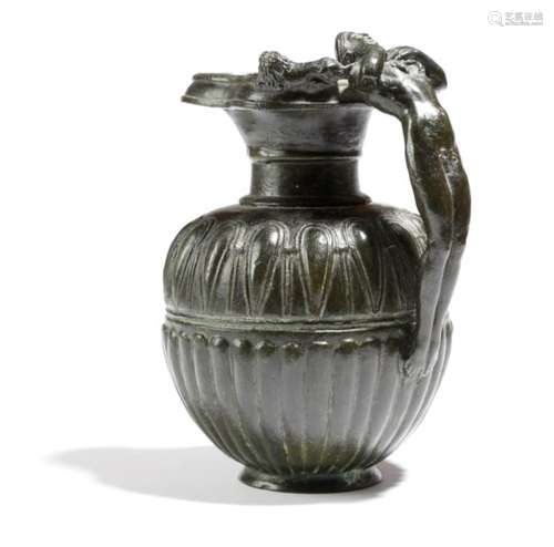 After the antique. A 19th century Italian bronze Grand Tour model of an Etruscan ewer, the handle in