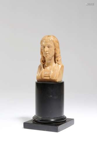 An early 19th century Italian giallo antico marble Grand Tour bust of a young man, mounted on a