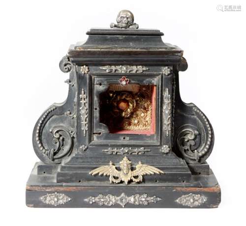 A 17th century Italian ebony and silver mounted crucifix base, applied with a skull and