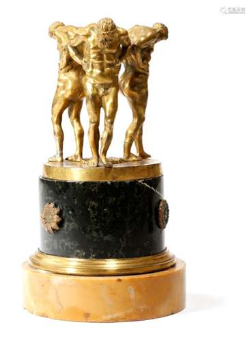 An early 19th century Italian gilt bronze tazza base, modelled with three Atlas figures, with