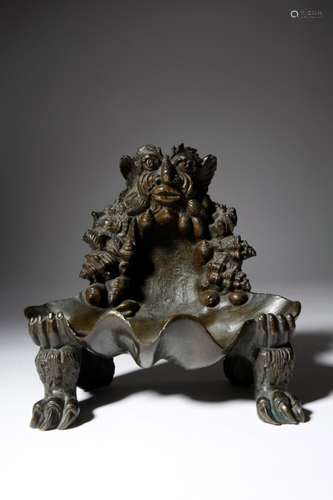 An early 19th century Italian bronze Grand Tour grotto desk stand, in the form of a grotesque