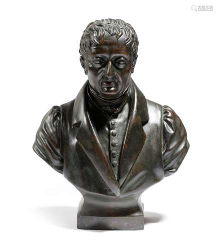 An early 19th century portrait bust of a gentleman, 22cm high.