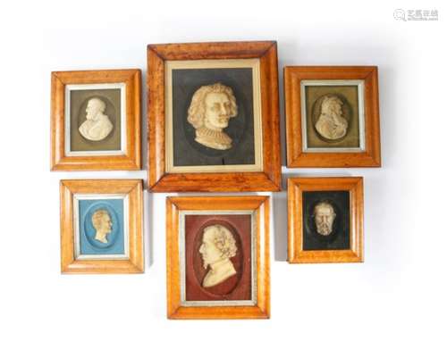 Six Victorian wax relief portrait busts, including: a pair of Plato and Aristotle, Abraham Lincoln