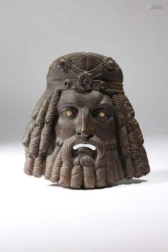 An early 19th century carved wood mask in the manner of Thomas Hope, of an Assyrian priest, 19.5cm