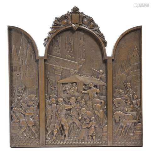 A late 19th century continental bronze triptych, relief decorated with a multitude of figures