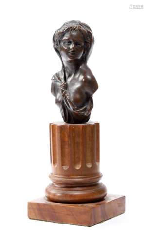 A 19th century bronze bust of a maiden, mounted on a later walnut socle, 19.5cm high.