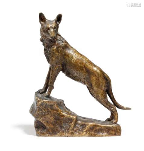‡ Marius Joseph Sain (French 1877-1961). A bronze model of a wolf, standing on a rocky outcrop, cast