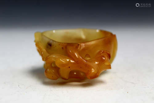 Chinese carved jade peach-shape cup.