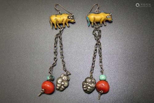 A pair of Chinese silver and red coral earrings.