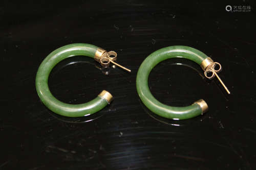 Pair of Chinese spinach jade and 14 K earrings.