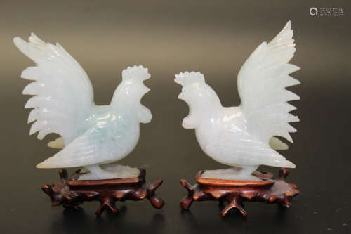 A pair of Chinese carved jadeite roosters.
