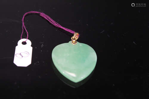 Chinese jadeite and 14 K gold pendant.