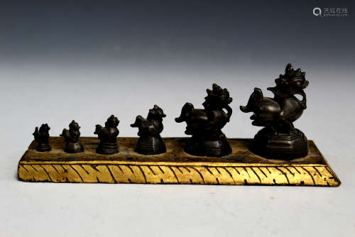 A set of six Antique bronze weights, set of six.