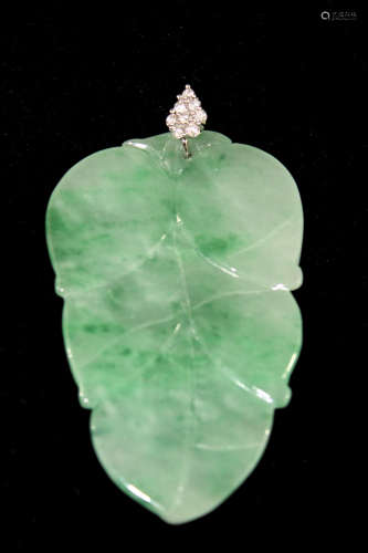 A Chinese jadeite diamond pendant in the shape of a