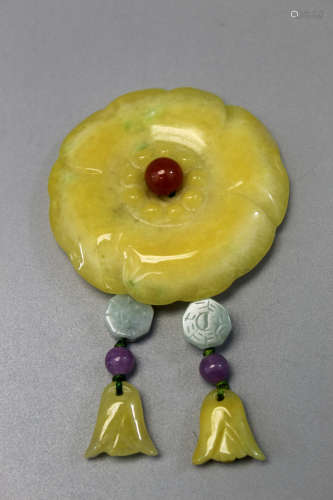 Chinese yellow jadeite flower pendant.