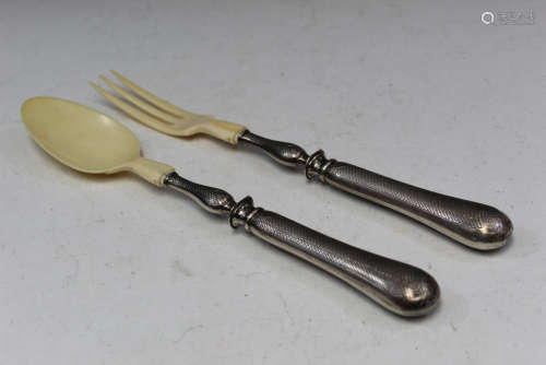 Sterling silver fork and spoon.