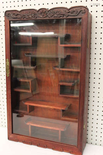 Chinese rosewood snuff bottle cabinet.
