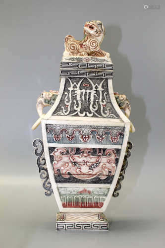 A Chinese carved bone vase.
