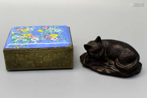A Chinese enameled box and bronze cat paper weight.
