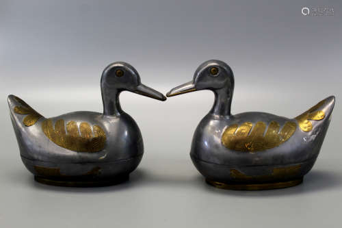 Pair of Chinese pewter duck boxes.