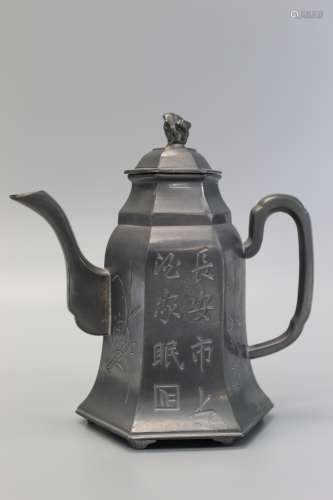 Chinese tin teapot.