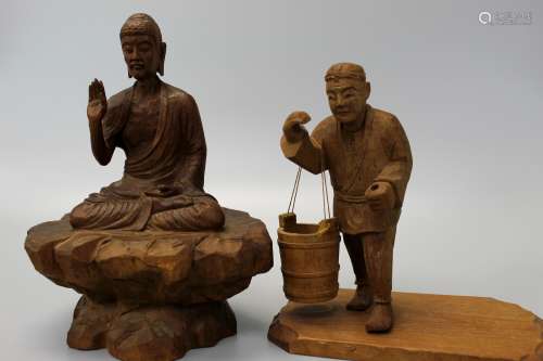Two Chinese wood carvings.