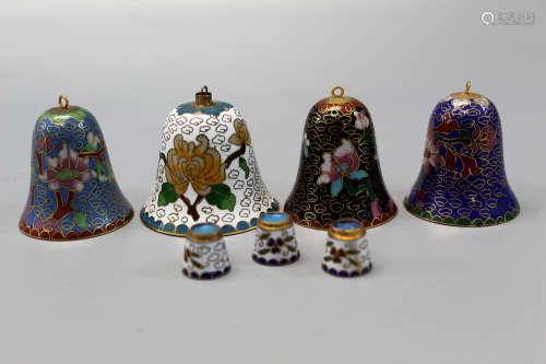 A group of four Chinese cloisonne bells.