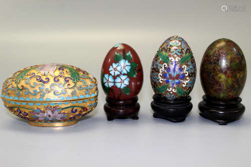 A group of Chinese cloisonne eggs.
