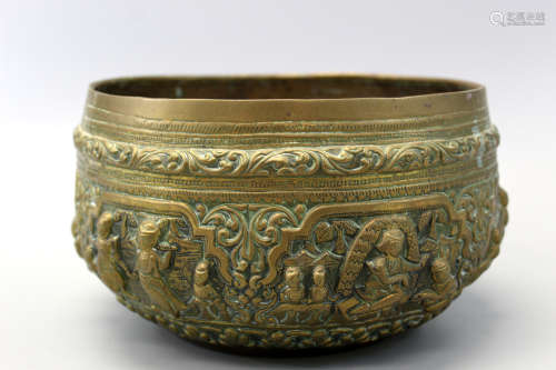 A brass Siamese bowl.