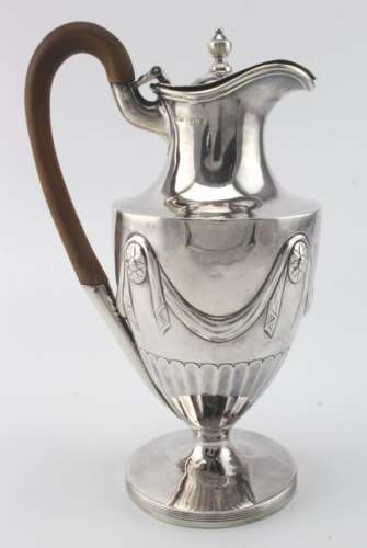 Adam style silver hot water jug with cancelled marks to the base and London Assay Office marks for